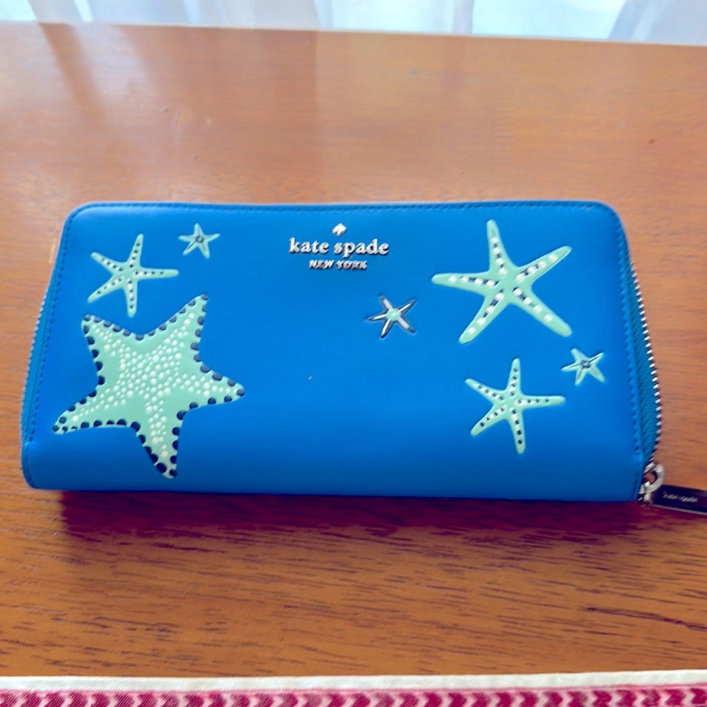 Barely used Kade spade large blue nautical wallet